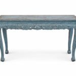 Console with carving